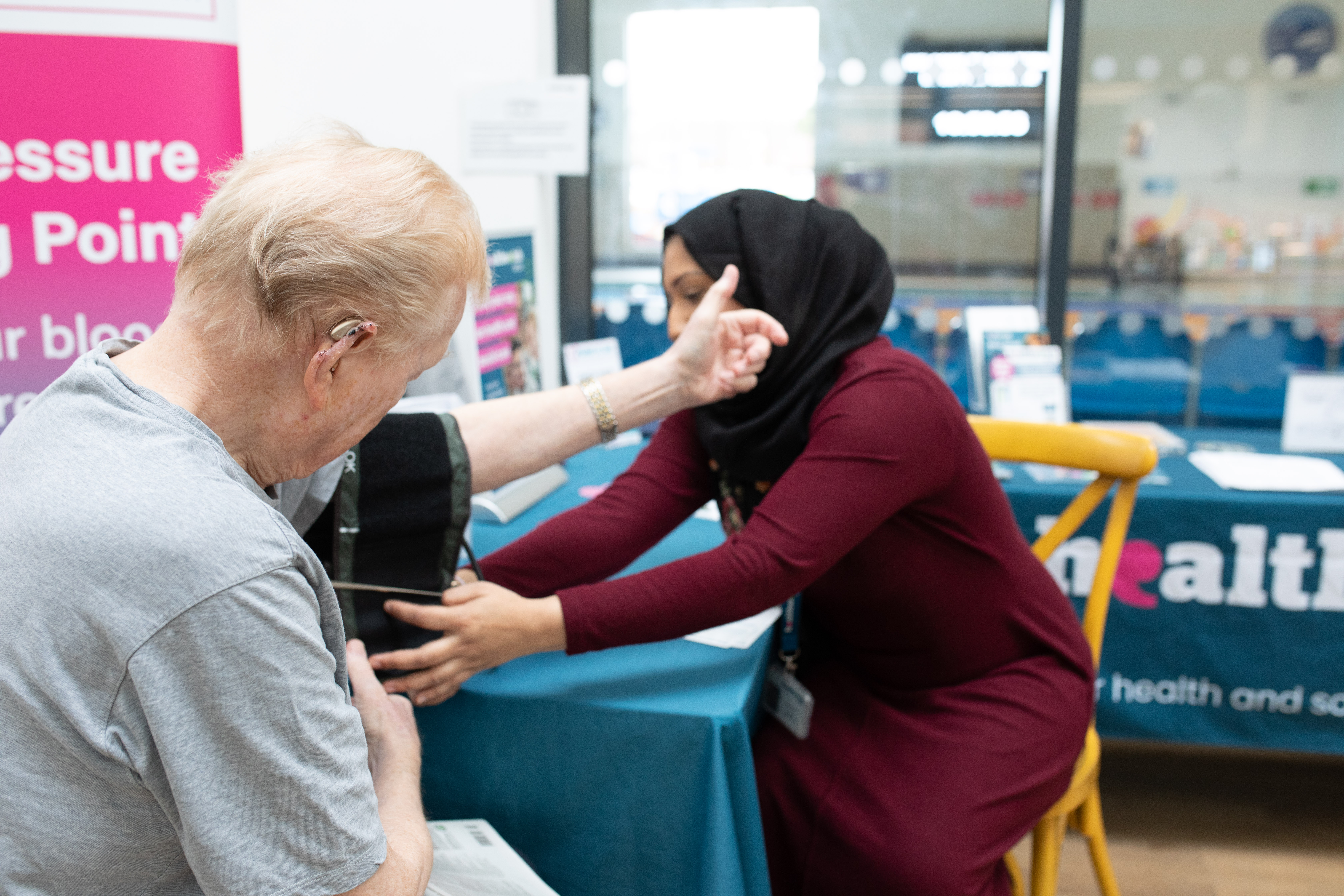 Seated man having a blood pressure test