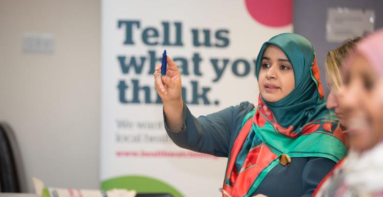 woman sharing views at event