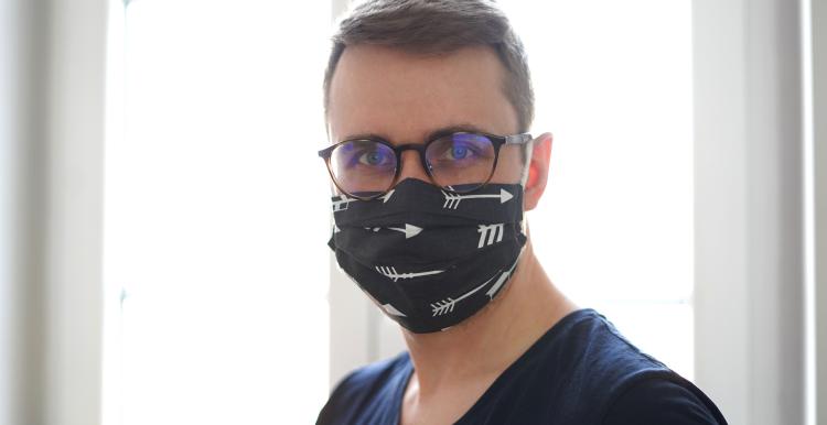 young man wearing mask