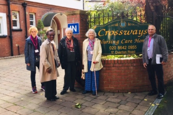 volunteers standing outside crossways care home